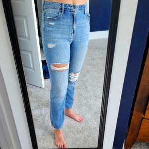 Never worn, high rise, ripped, light jeans